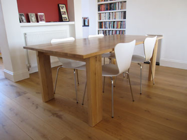 Oak dining table with wenge detail