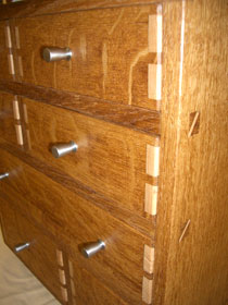 Brown oak collectors cabinet